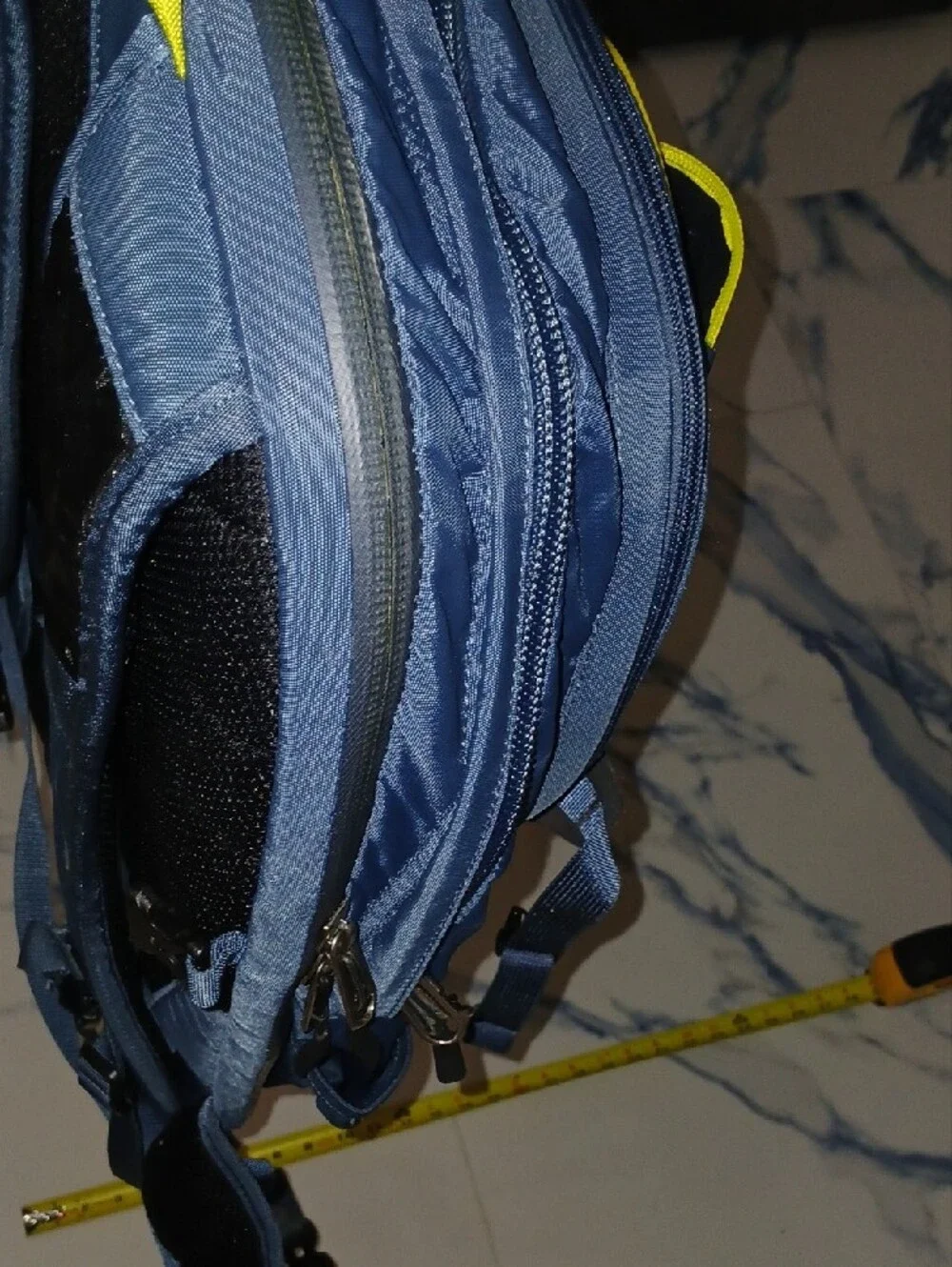The North Face Navy Blue Backpack with Yellow Accents